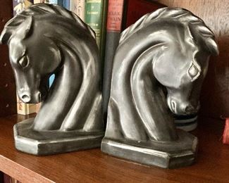 $50 - Pair of ceramic horsehead bookends.  Each 6" H. 