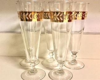 $35 Set of 5 gold-trimmed stemmed beer glasses.  Each 8.25" H, 3" diam. 