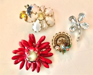$10 each colorful vintage pins.  Red flower  AVAILABLE 2.5" diam.  circle pin SOLD  1.25" diam, rhinestone shamrock AVAILABLE  1.5" H, white flower SOLD  1.75" H x 2.25" W.   