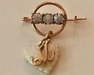 $50 Victorian pin with heart drop. 1.25" H, 1" W.