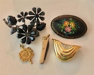 $12 each vintage pins, fur clips, charms.  Brooch top left: 2.75" x 2.25".  Brooch top right: 2.25" W x 1.5" H. Fur clip: 2" W x 1.5" H Jack knife pendant SOLD 