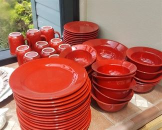 red dishes from Pier one, $100 for the entire set