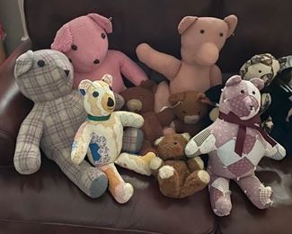 many vintage plush and animals made from quilts and vintage fabric