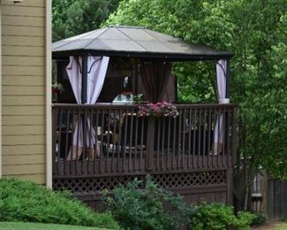 large patio with lots to see/sale (tenting not included in sale)