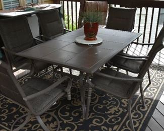 outdoor table and chairs, rug