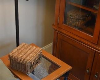 glass top end table, floor lamp, cabinet
