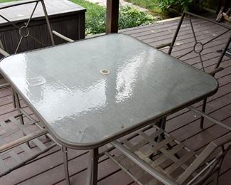 outdoor table and (4) chairs