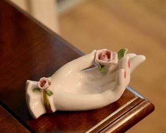 ceramic rose in hand
