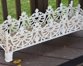 painted iron plant holder