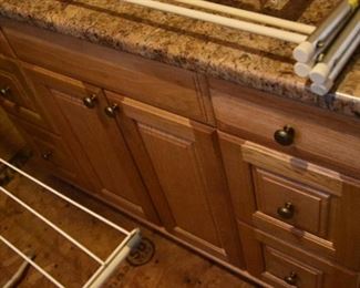 wooden cabinet, laminate top (in laundry room)