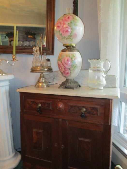 Lamp, marble topped washstand & castor set