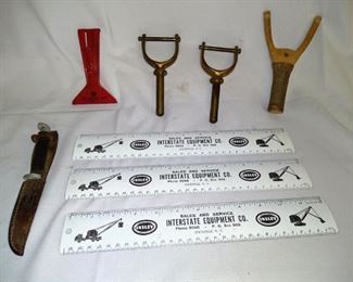 Brass oar locks, sling shot, advertising rulers