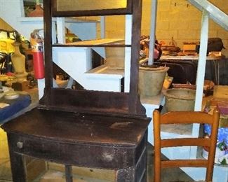 Dresser with large mirror and towel rack