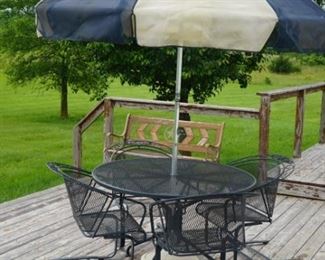Patio set table, four chairs with umbrella  48 in round