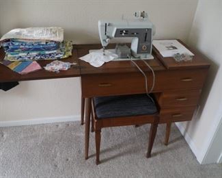 Touch and Sew Model 600 Singer Sewing Machine and supplies
