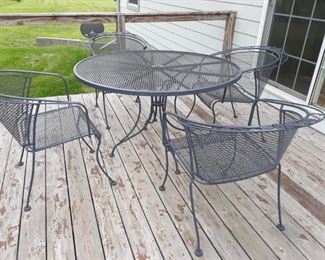 Wrought Iron table and 4 chairs