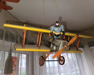 Batman Riding A Plane