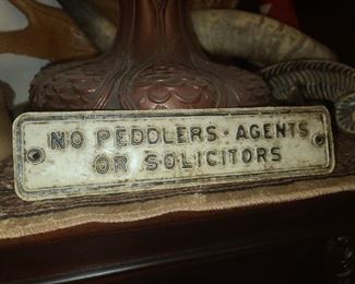 Vintage Embossed Metal Sign