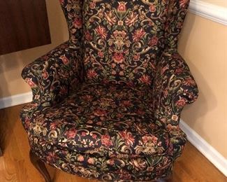 2 matching black/floral wing back chairs....