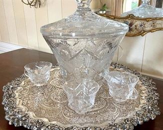 Stunning crustal punchbowl with cups...makes for a stunning centerpiece!