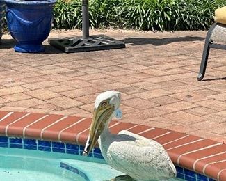 Vintage yard art...hand painted pelican is too cute for words