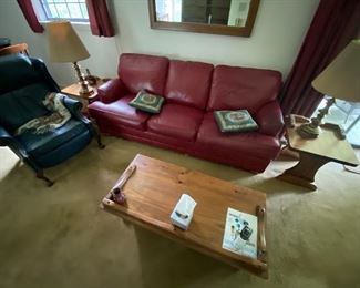 Red leather couch (blue chair went to family) 