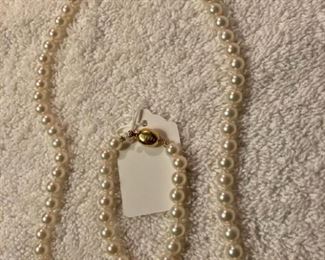 22" long TASAKI Akoya pearls, 18k clasp
