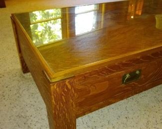 This is the turn of the century library table made out of Oak legs cut down to make a coffee table. Gorgeous piece.