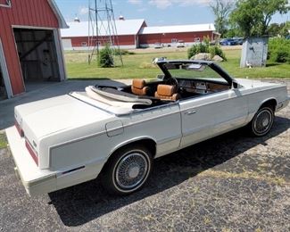 1982 Chrysler LeBaron convertible. Taking offers until this Friday June 18 12 p.m. Call Gail with offers 630-432-0926. You can view it Wednesday June 11:00 a.m. - 2 p.m.