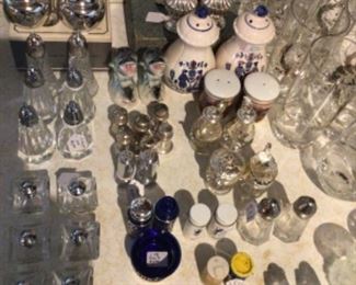 Large assortment of salt and pepper shakers 
