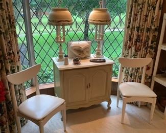 Mid century modern style chairs and cream chest