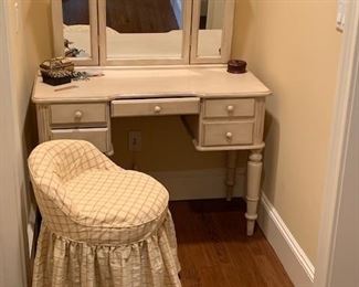 painted vanity with swivel stool