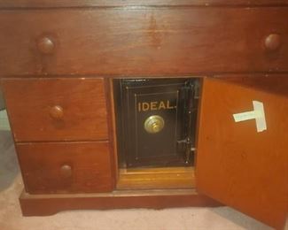 -Circa 1920's- Beautiful Cherry Wood. Solid construction,  not rickety at all. 3 number combination and we have the combo!