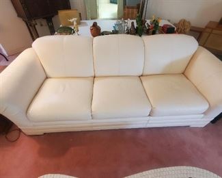 Genuine Leather. No tears, rips or stains. Sleeper Sofa!