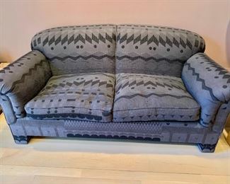 Charcoal upholstered love seat with down filled cushions; 34"H x  75"W x 36"D 