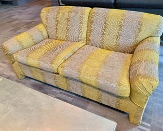 $895 - Custom made twill upholstered love seat. 30"H x 67.5"W x 31"D. Height to seat is approx. 20"H
