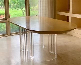 $1,800 - Jeffrey Bigalow acrylic pedestal dining table with solid wood top - 29"H x 84"W x 44"D . Wear consistent with usage and age. 