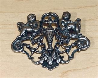 $65 - Sterling Silver baroque cherub brooch KS#62; approx 3"W x 2"H