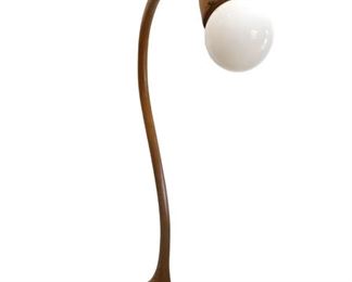 $5200 - Wood sculptural floor lamp; attributed to Wendell Castle, Studio Collection; unsigned; 76"H x 44"W