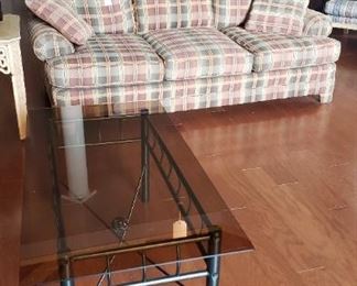 Same as previous photo. 2 matching plaid sofas