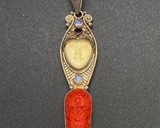 Sterling Silver Sajen Carved Face Floral Cinnabar Pendant