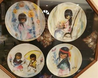 DeGrazia collector plates, framed with feather decoration. Includes certificates of authenticity.