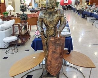 Knight in shining armor!  We have three of these unique tables.