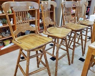 Four very well made oak bar stools