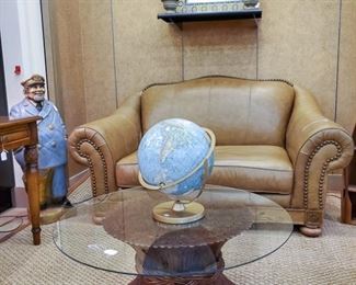 Vintage globe, amazing glass table, leather loveseat!  