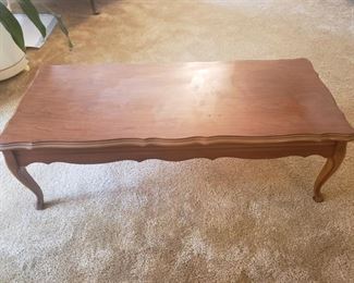 This elegant coffee table matches the two end tables in this sale. Our client said she bought the entire set in 1966. The table measures approximately 58" long by 22" depth by 17" tall. https://ctbids.com/#!/description/share/932855