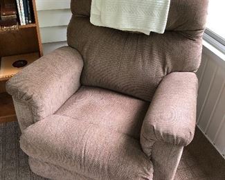 Upholstered reclining chair.