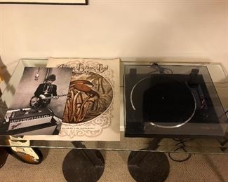 Thorne’s TD 170 turntable; posters featuring Bob Dylan and The Allman Brothers Band.