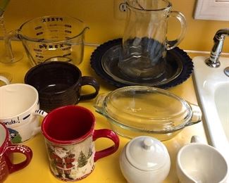 Kitchen contains quality cookware, small appliances and glassware.