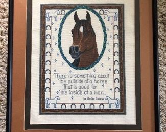 Framed needlepoint horse with Winston Churchill quote.